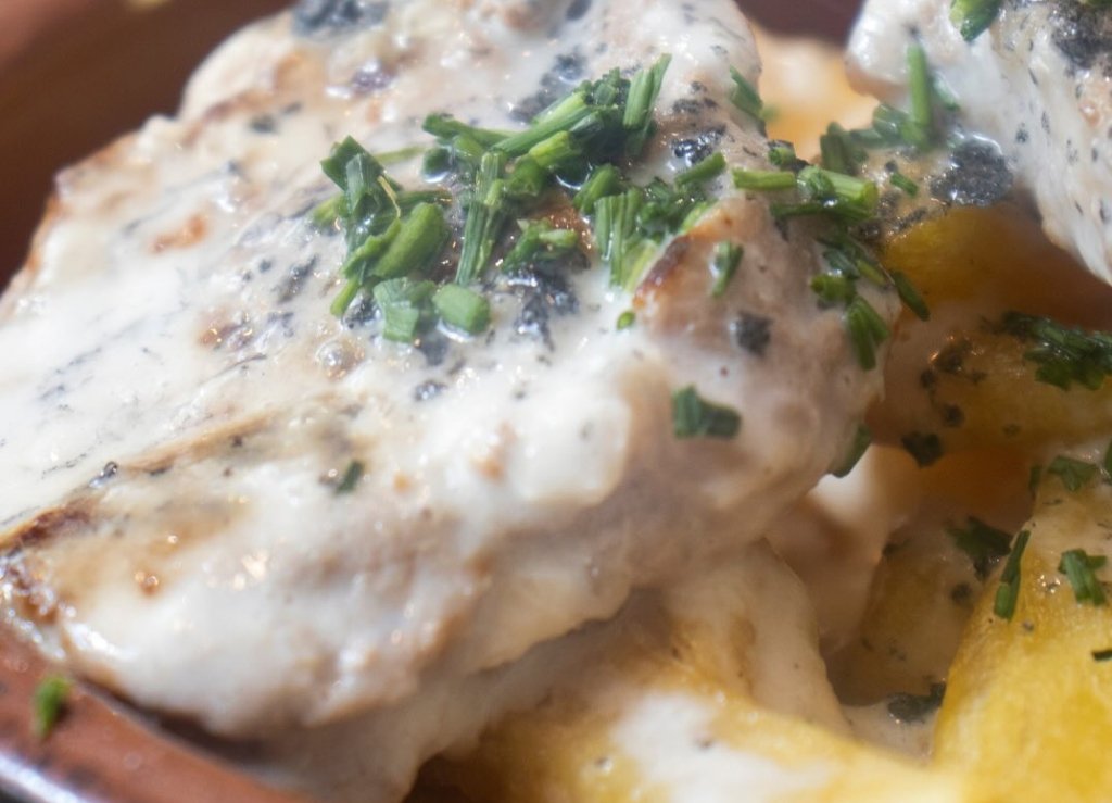 EntreCastillos- Roasted pork in a creamy sauce with potatoes